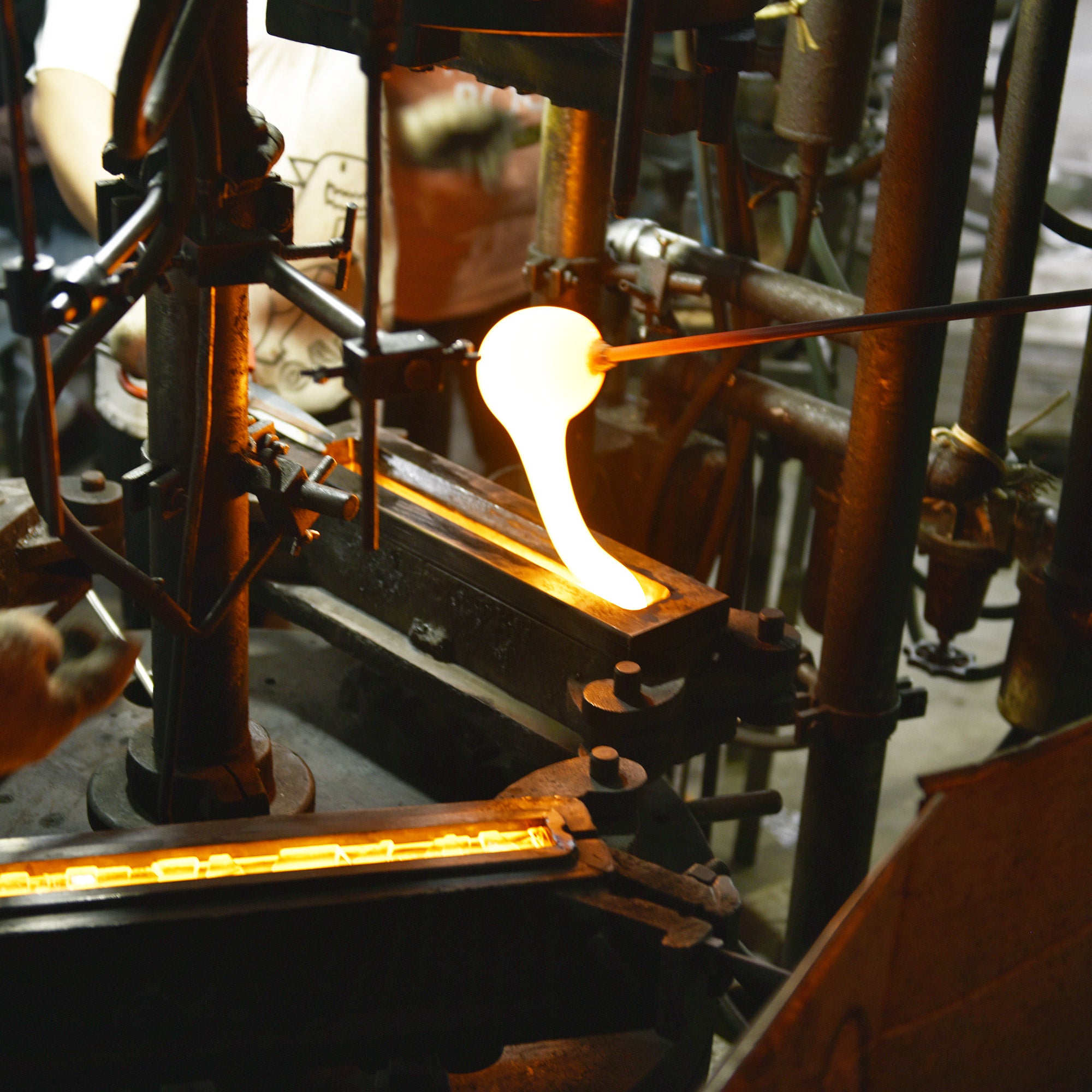 Saber Integrated LED 50in Black Chandelier with Handcrafted Glass