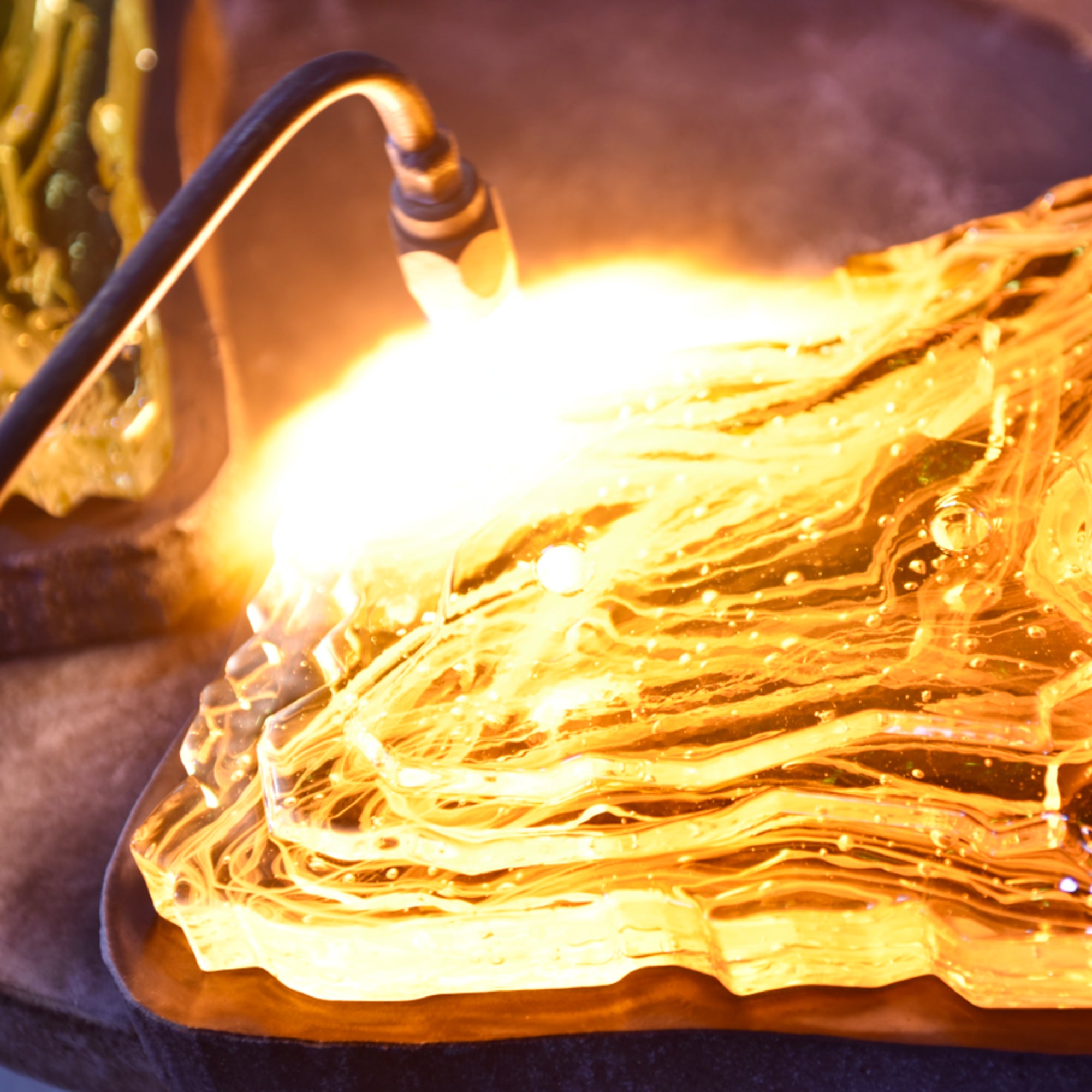 Arcus Integrated LED 50in Brass Chandelier with Handcrafted Glass