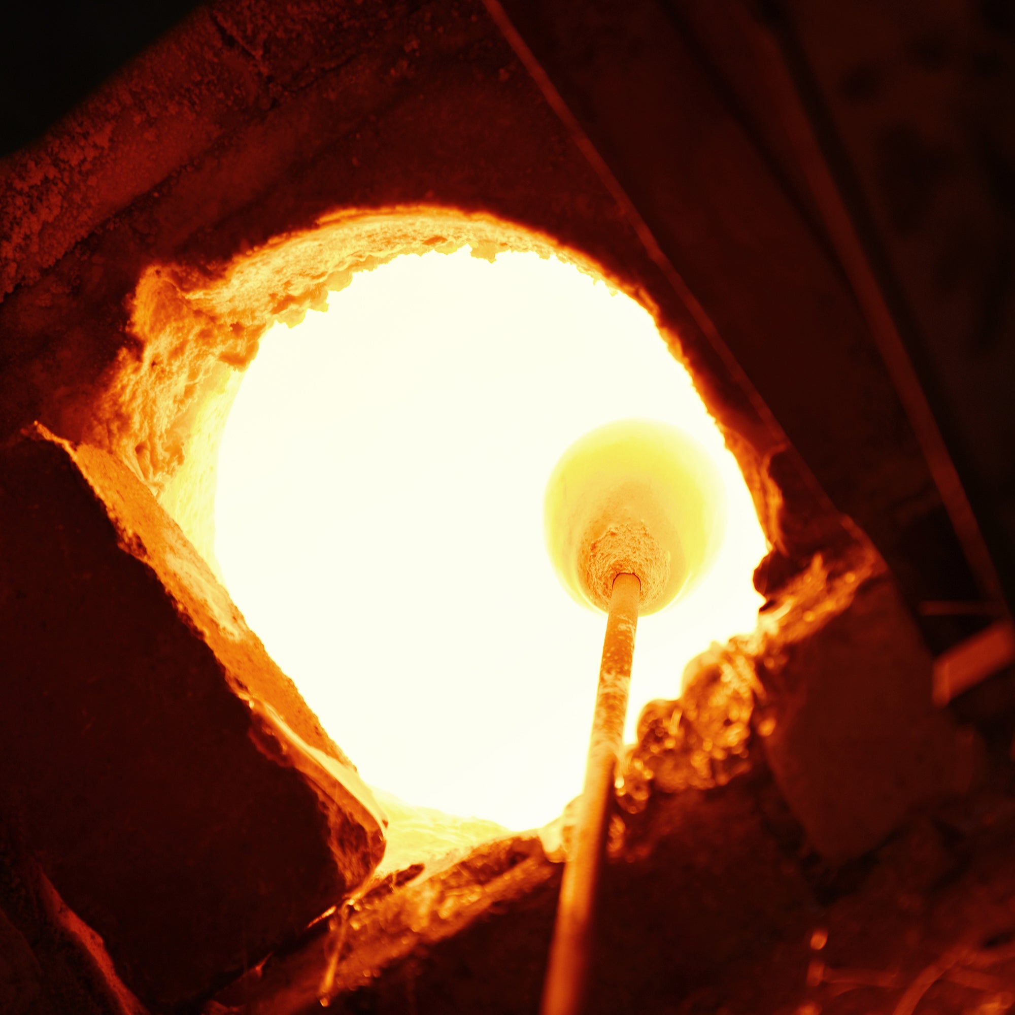 Arcus Integrated LED 50in Brass Chandelier with Handcrafted Glass