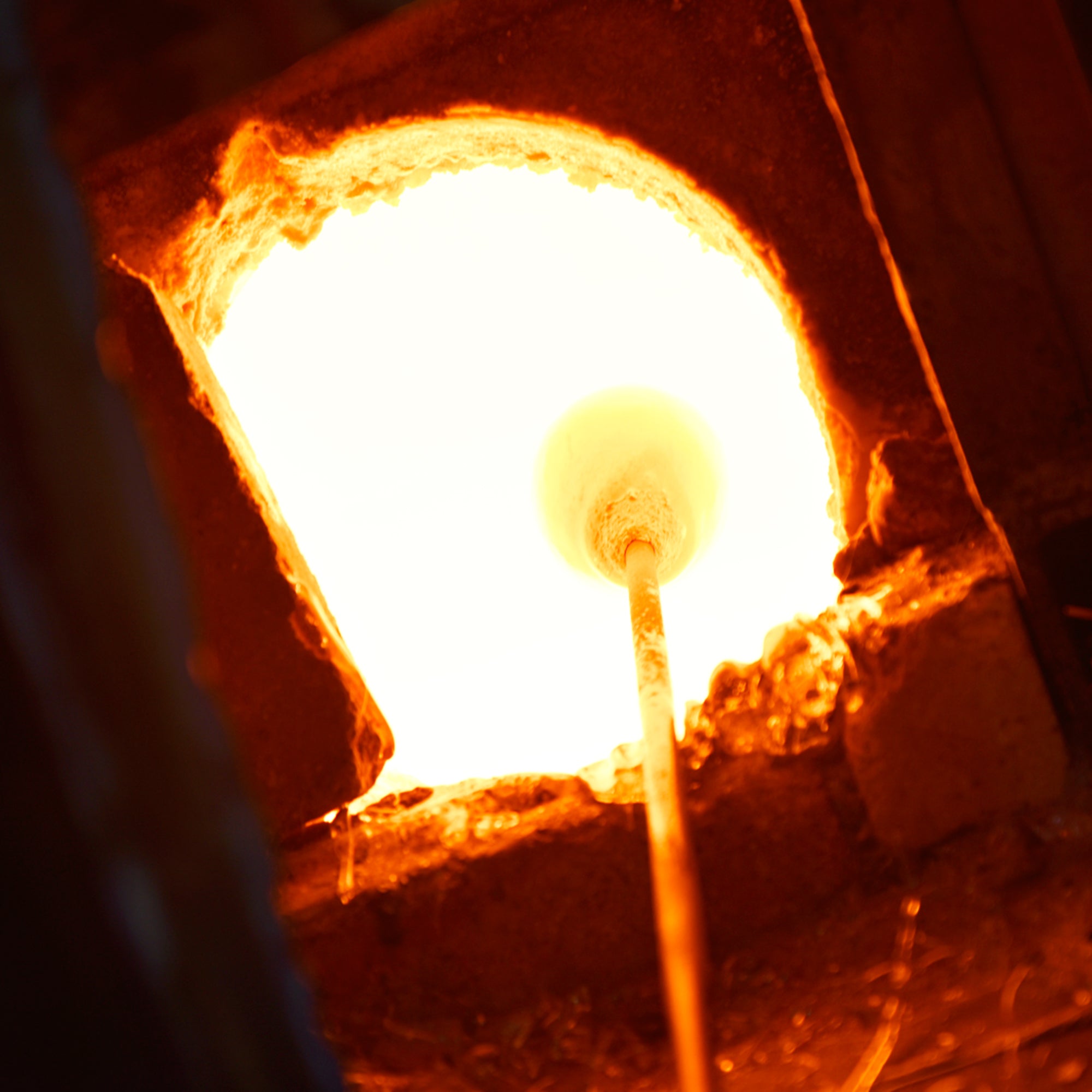 Petra Integrated LED 22in Brass Wall Light with Handcrafted Glass